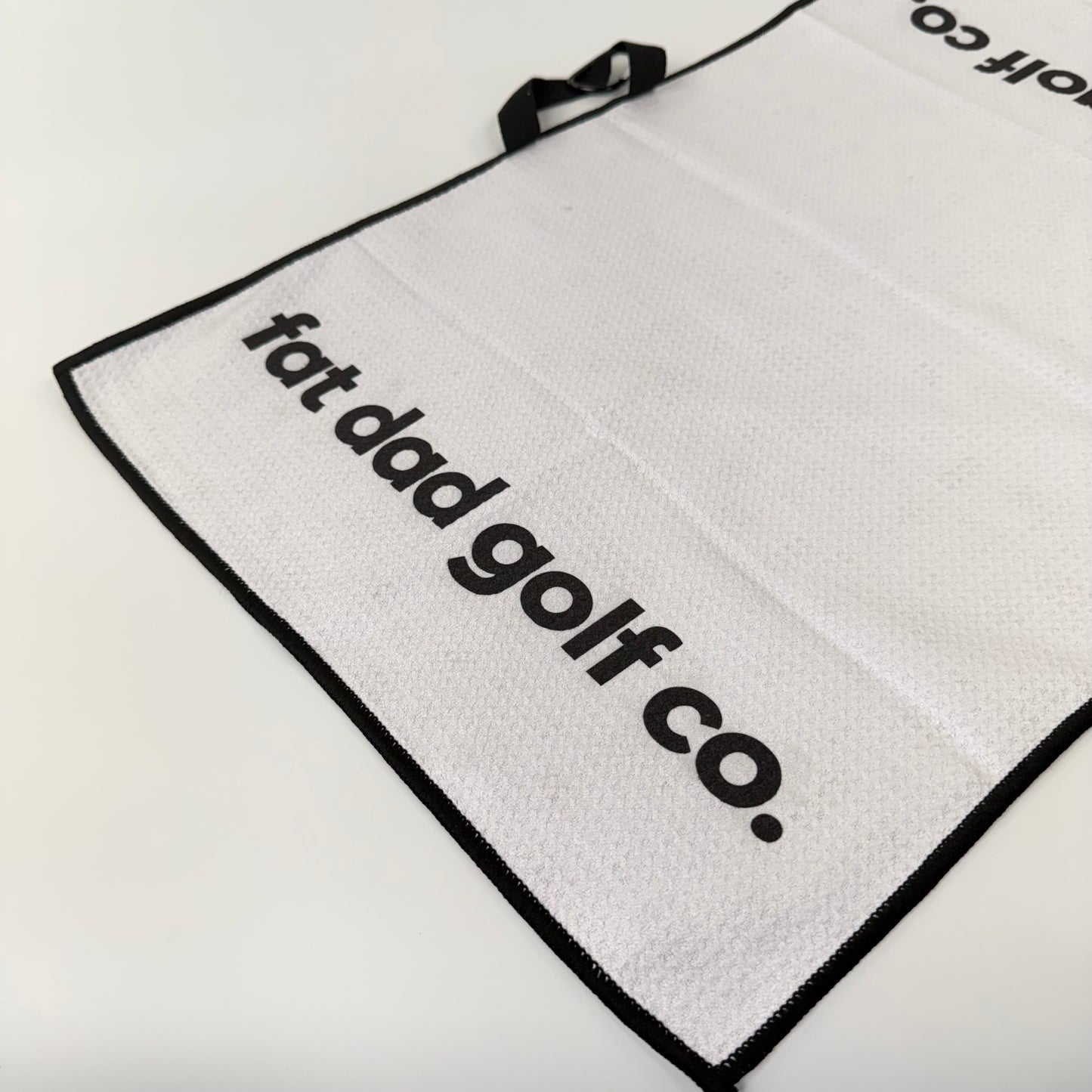 "fat dad" signature print golf towel